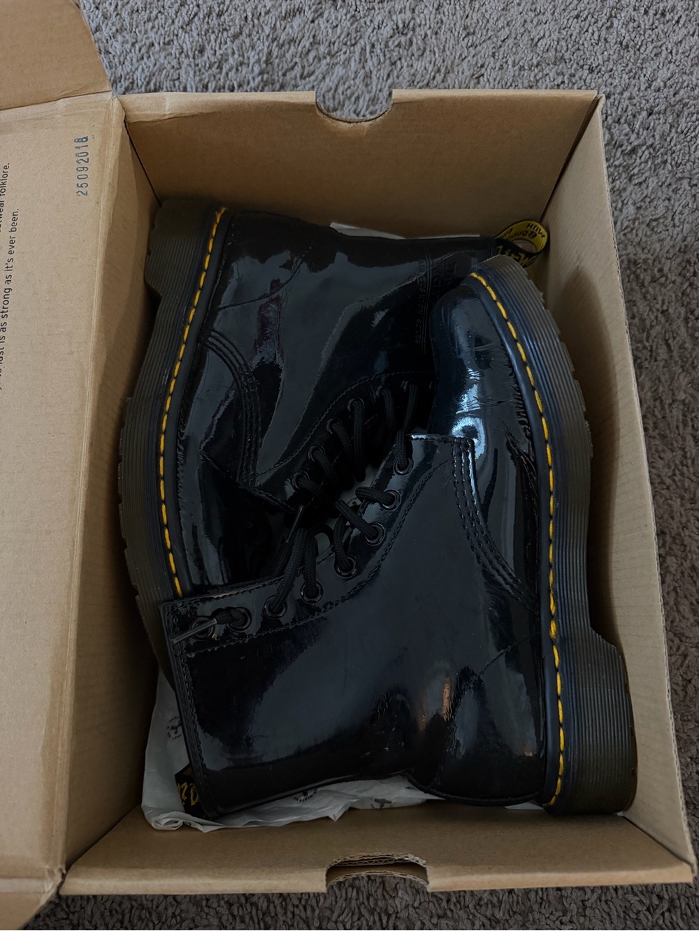 Dr. Martens Black Patent Lace-Up Boots with Yellow Stitching